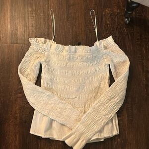 White off the shoulder ruffled long sleeve